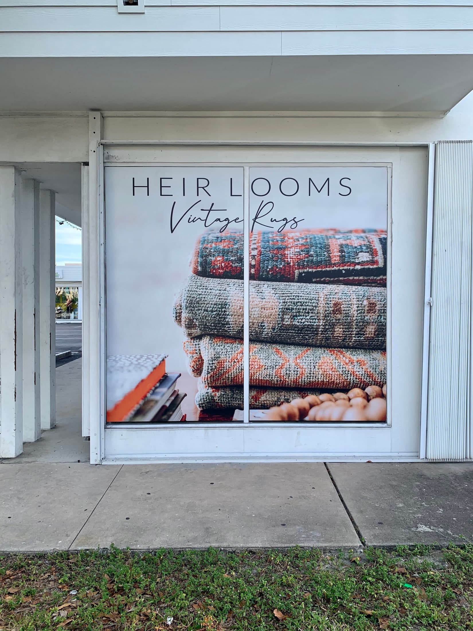 Storefront window graphics for a vintage rug gallery for Heir Looms Vintage Rugs, Palm Beach, FL
