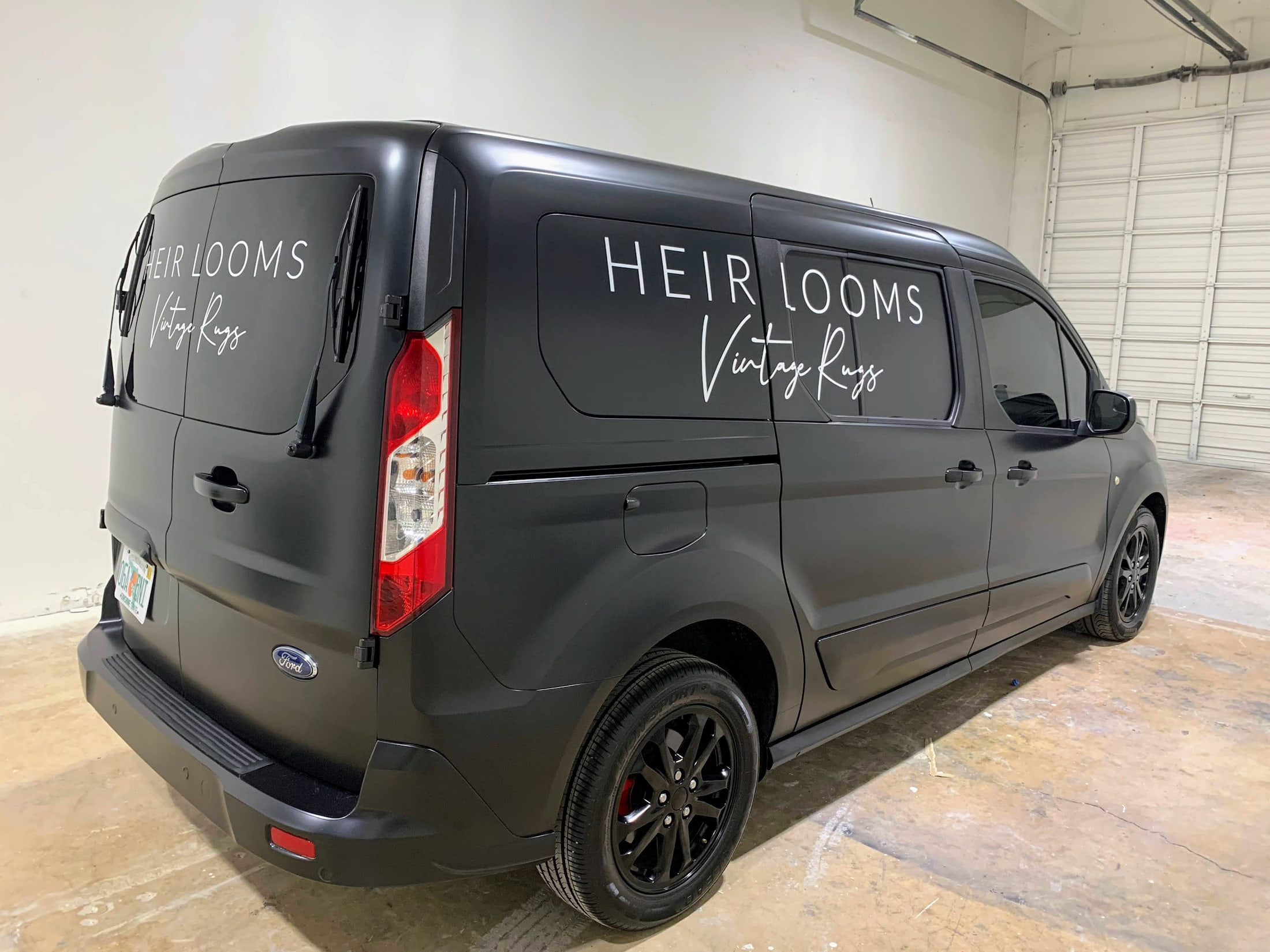 Van lettering for a vintage rug gallery for Heir Looms Vintage Rugs, Palm Beach, FL