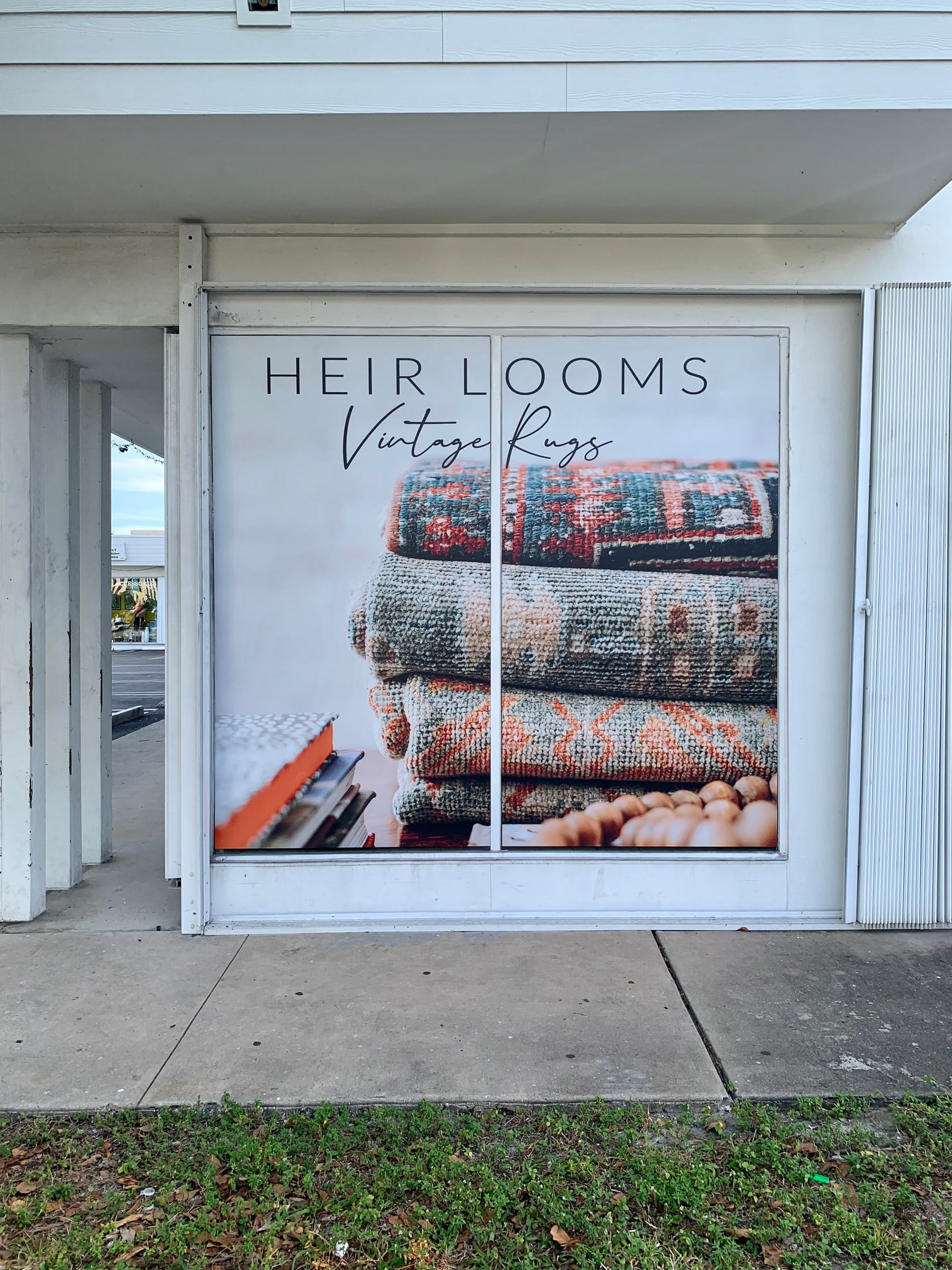 Storefront window graphics for a vintage rug gallery for Heir Looms Vintage Rugs, Palm Beach, FL