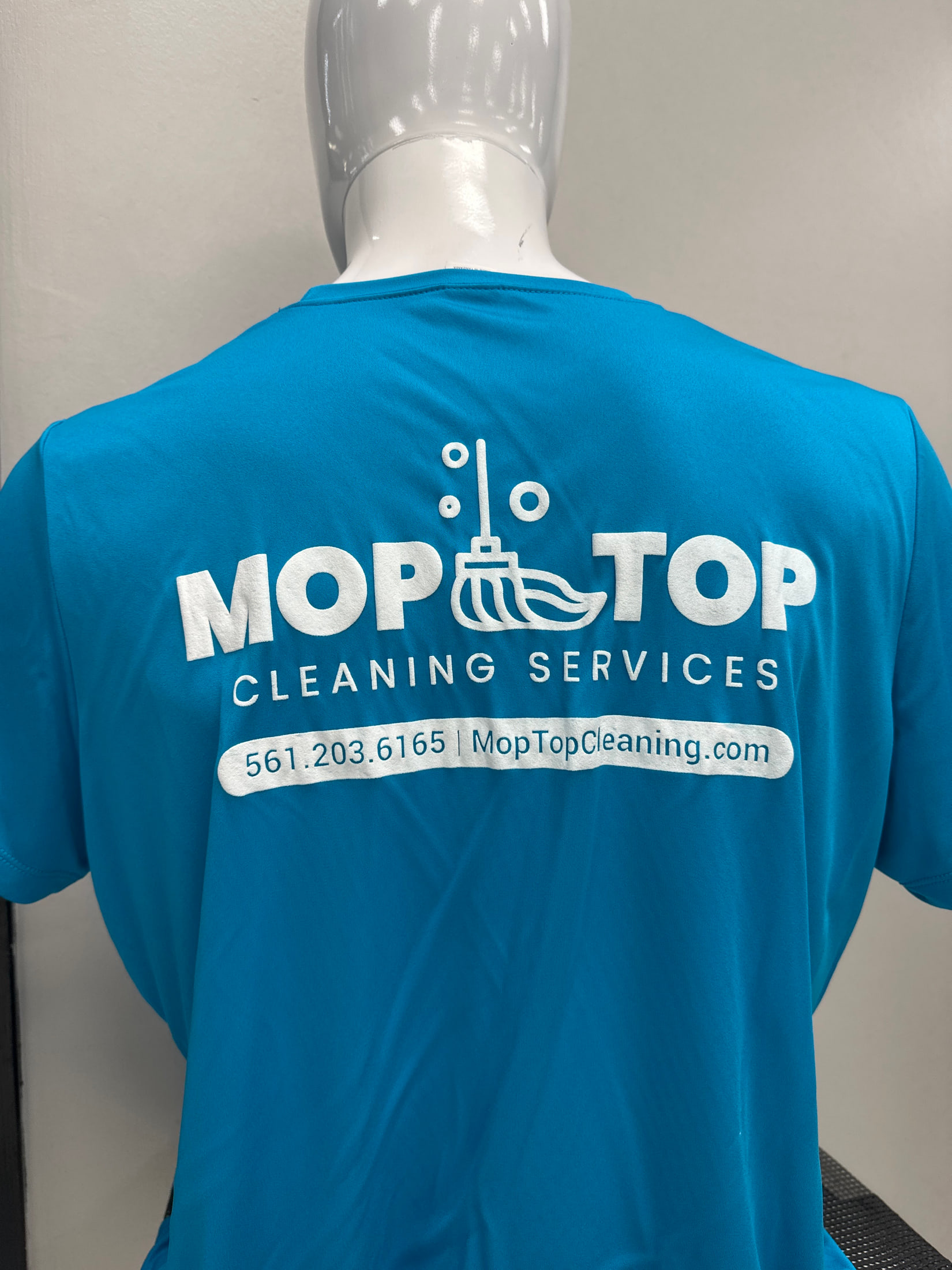 Branded crew shirts for a cleaning company for Mop Top Cleaning Services